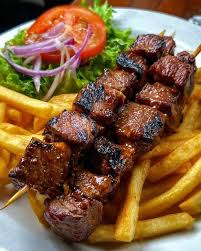2 Beef Brochette served with Chips and Salad