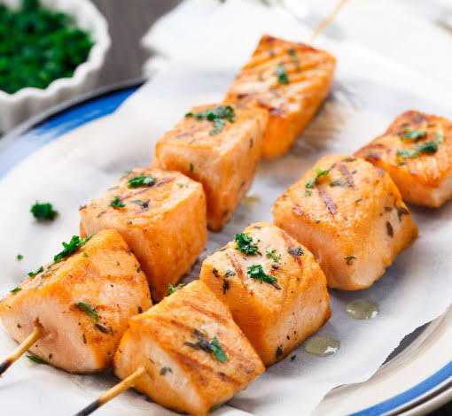2 Fish Brochette served with Chips and Salad