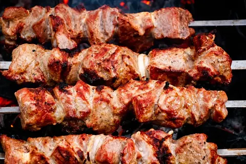 2 Goat Brochette served with Chips and Salad