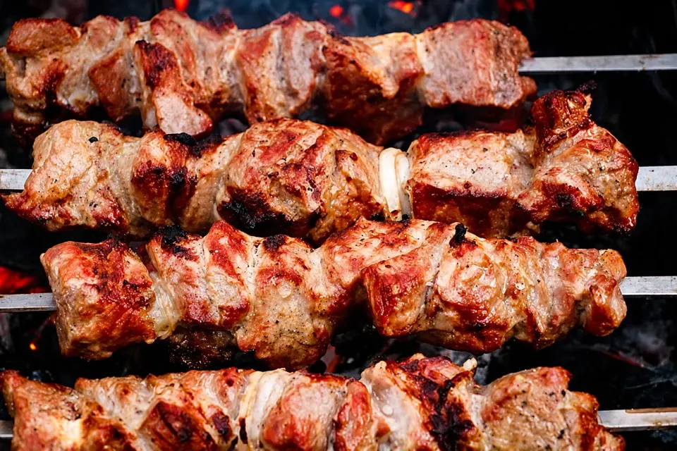 2 Goat Brochette served with Chips and Salad